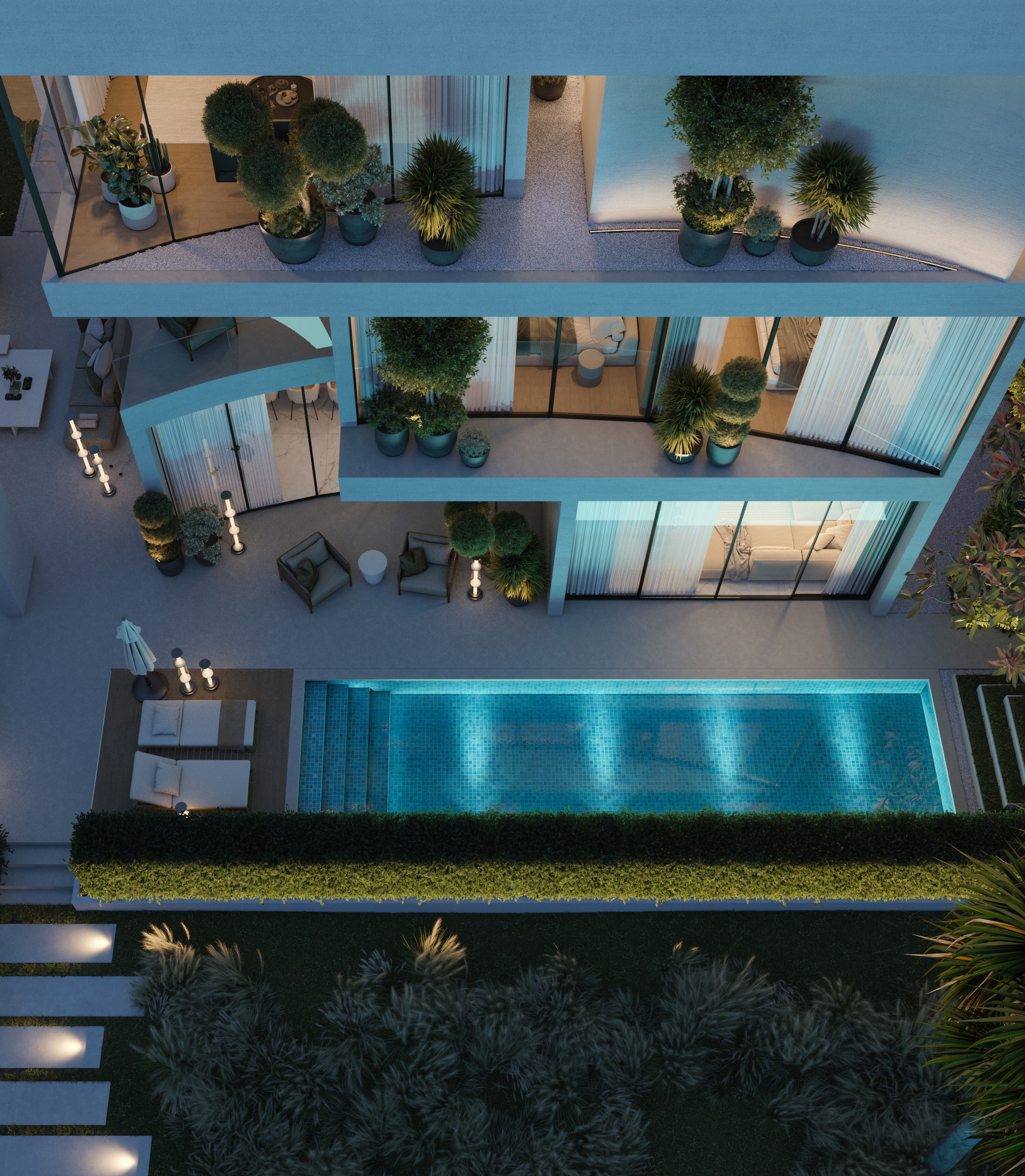 Lunaya villa at night with illuminated pool